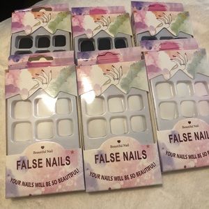 6 pack of press on toe nails. 3 white and 3 black.